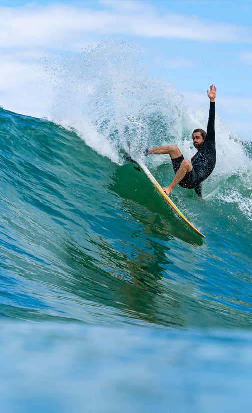 About_SRFACE_Surfer_doing_a_lay_back_turn.jpg