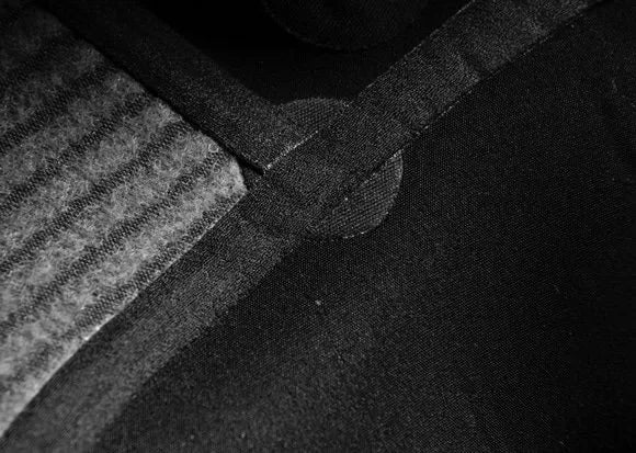 Seam reinforcement point on a wetsuit